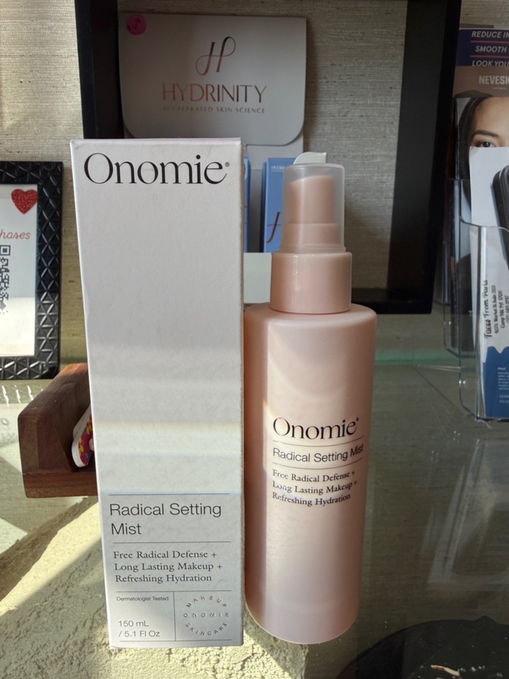 nomi Onomie Radical Setting Mist - Pale Pink Spray Bottle
